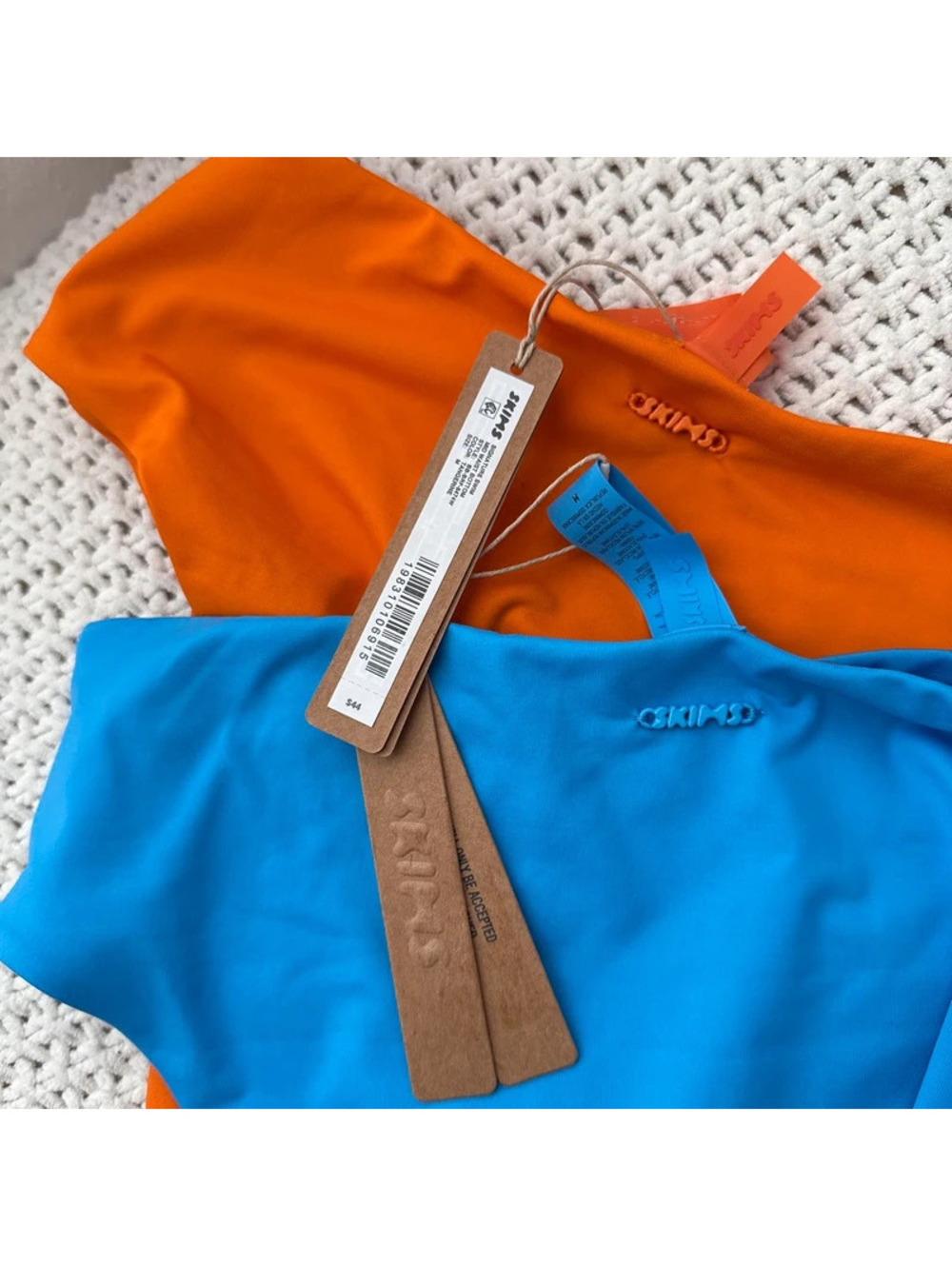 2 skims signature swim mid waist bottoms colors tangerine and tide